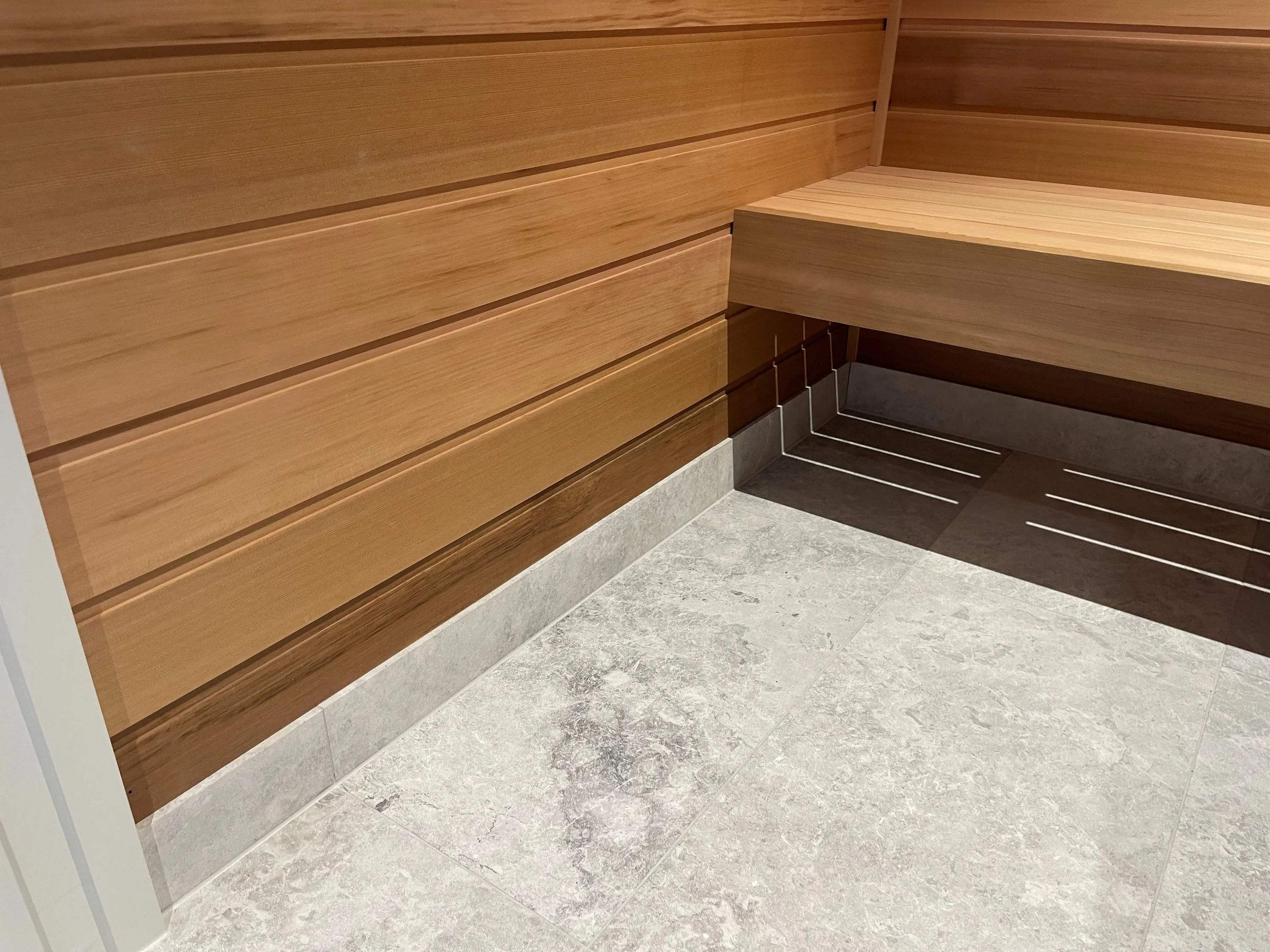 Floating timber bench with concealed lighting beneath