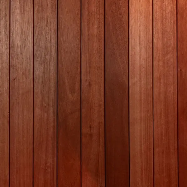 Close-up of reddish-brown vertical timber boards used for the sauna lining.