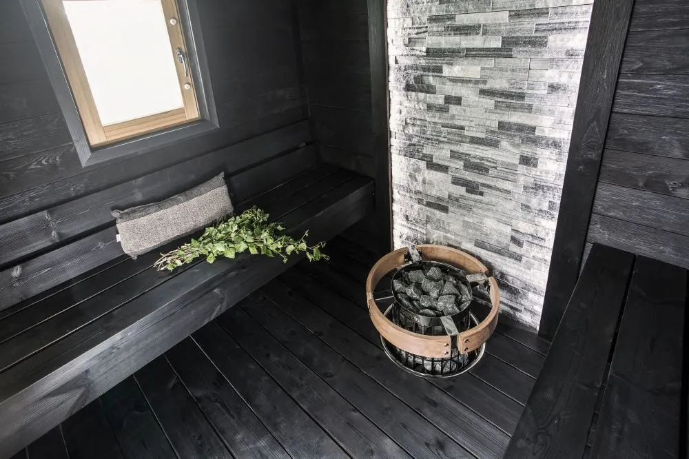 Harvia Cilindro heater in a sauna with Harvia Scala benches