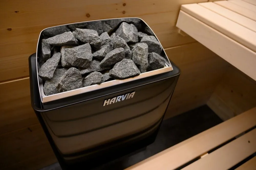 Black Harvia KIP heater installed in a sauna