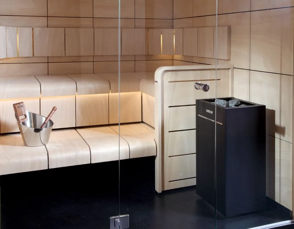 Harvia Virta Combi in black in a sauna with Harvia Ventura benches